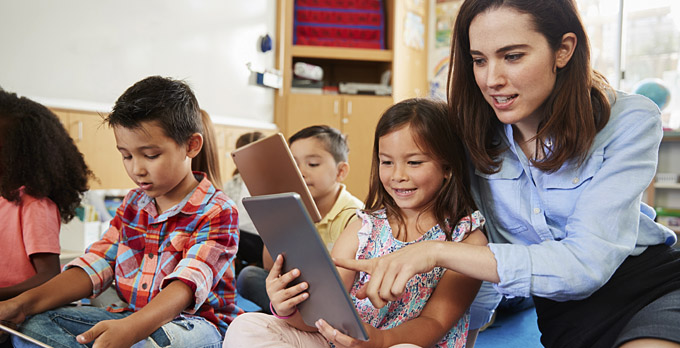 Teacher reading to students